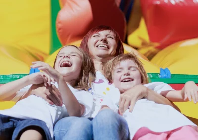 Mother and Children on Bounce House